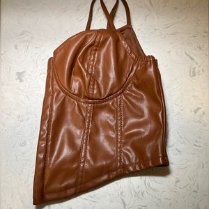 Brand: IRIS —color is tan or brown— the top clips on —lifts breasts—LARGE